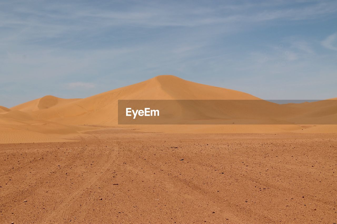 Scenic view of sahara desert against sky