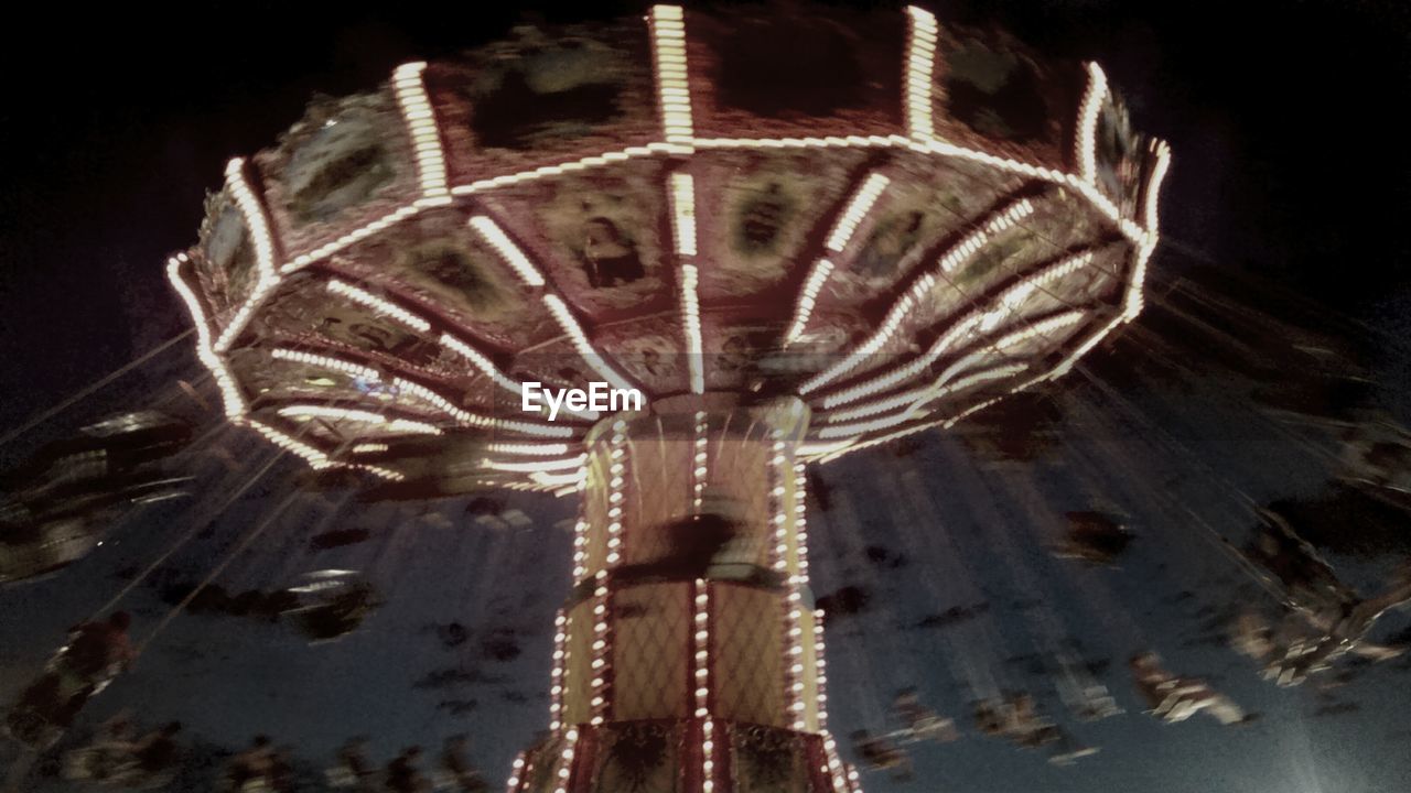 View of carousel at night