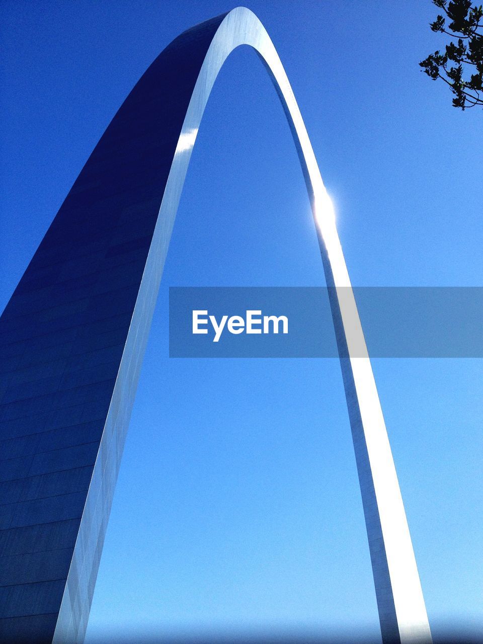 Low angle view of gateway arch against clear blue sky