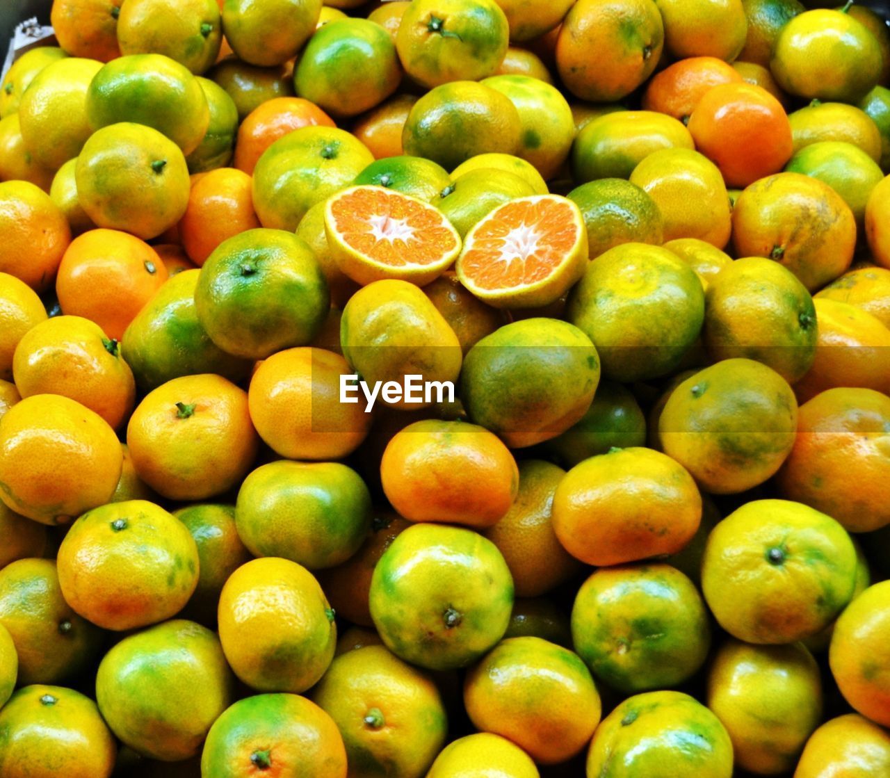 Full frame of orange fruits for sale