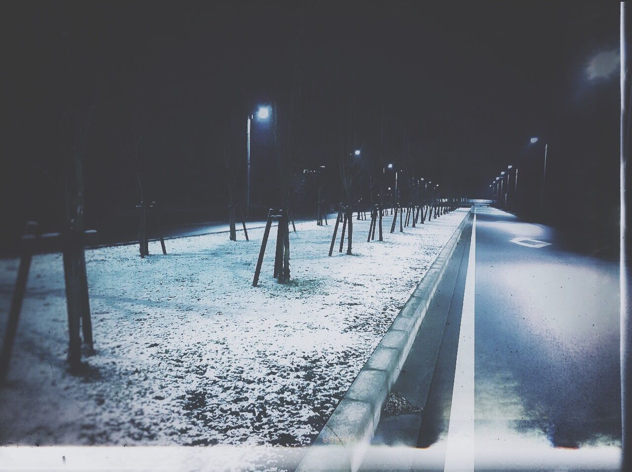 VIEW OF ROAD AT NIGHT