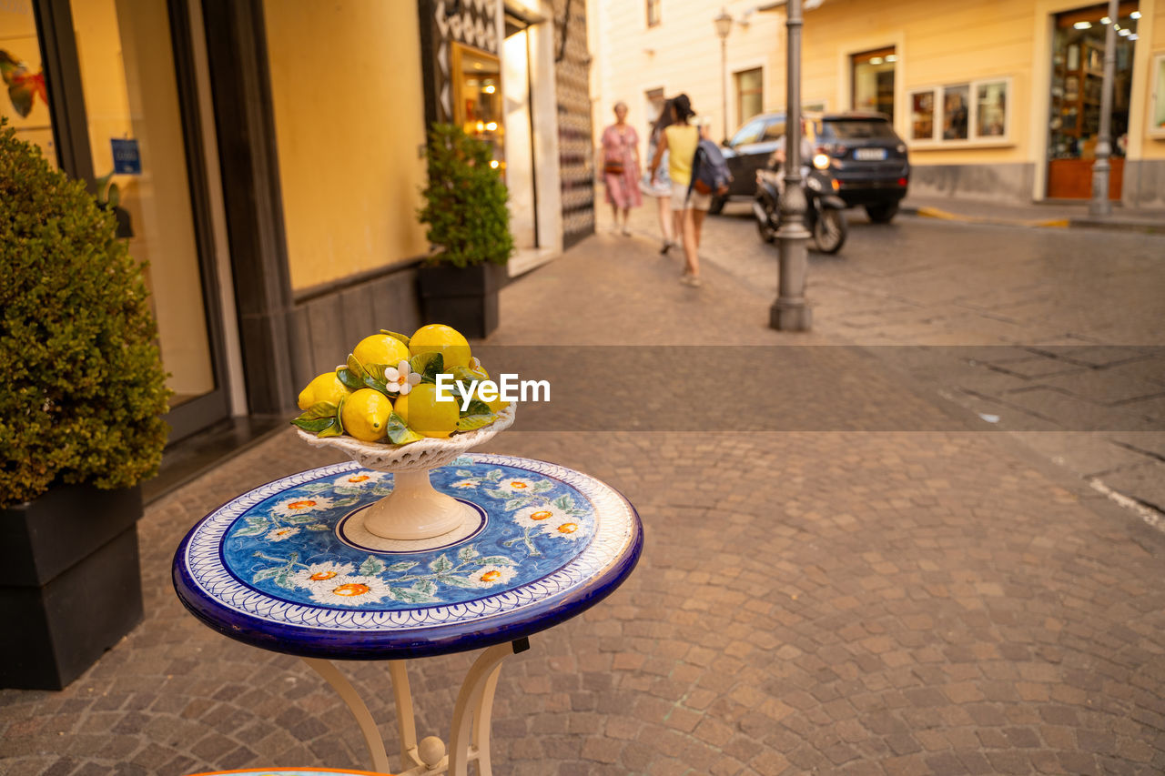 Bunch of lemons kept on display on a street of sorrento, italy