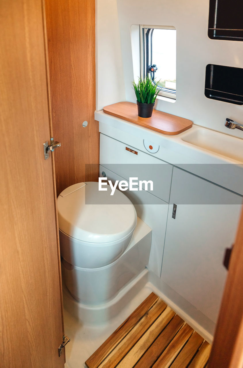 Campervan bathroom interior with toilet