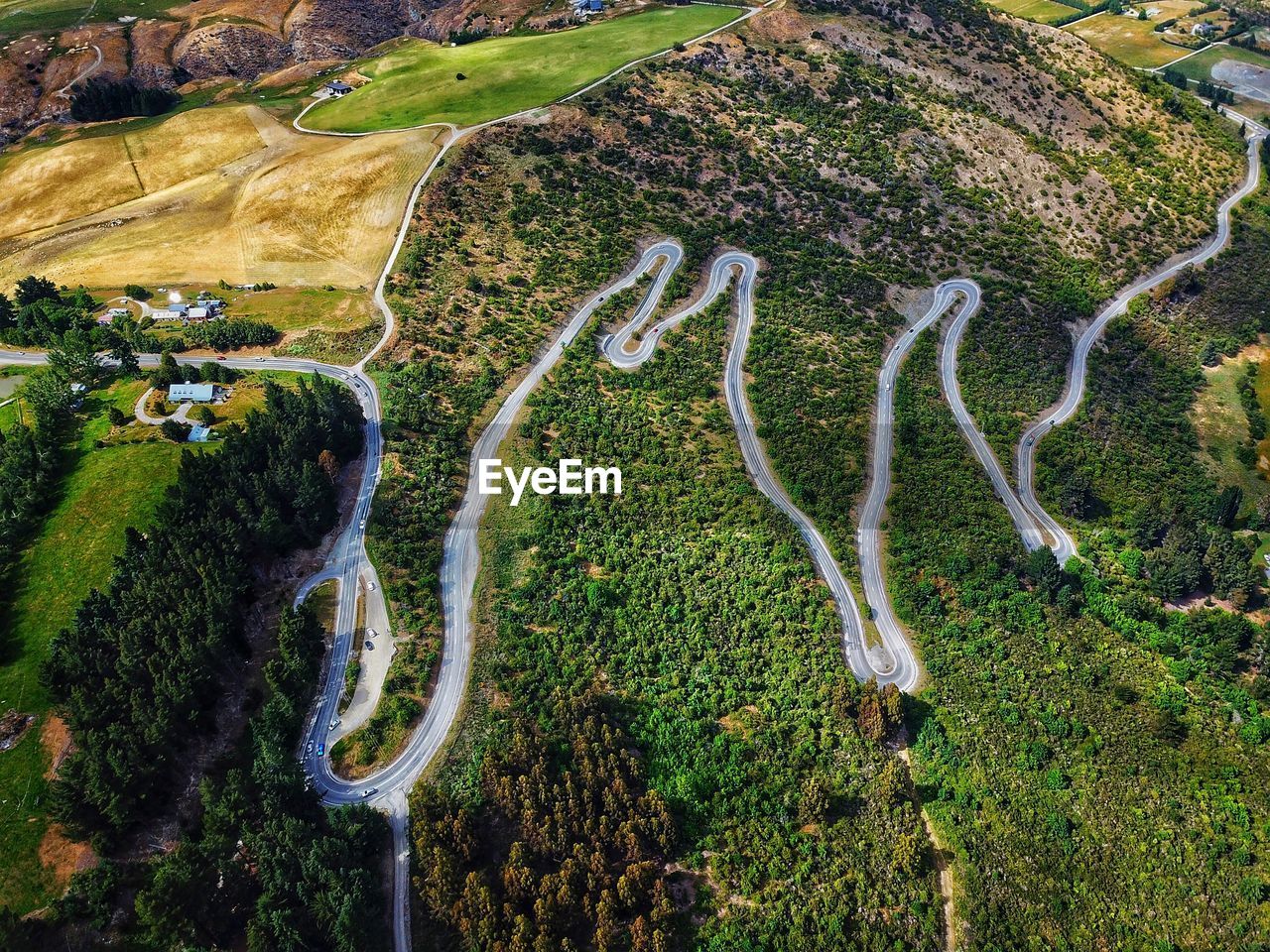 High angle view of winding road on landscape