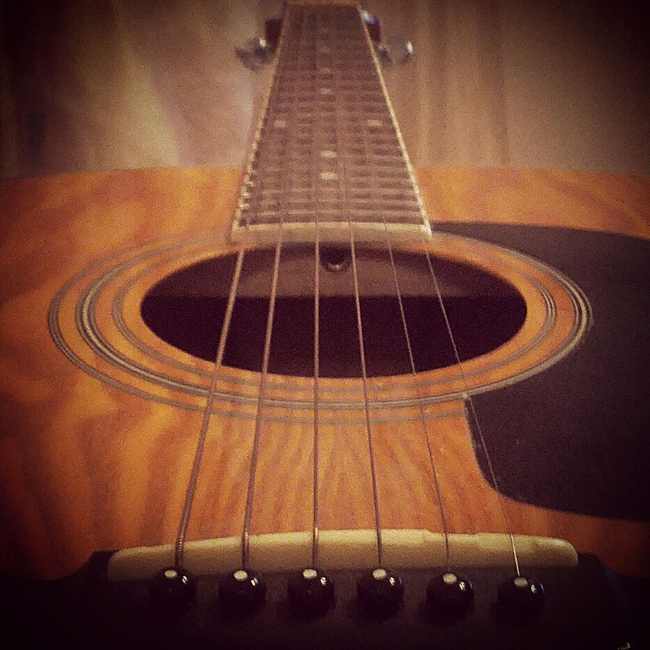 CLOSE-UP OF GUITAR ON STAGE