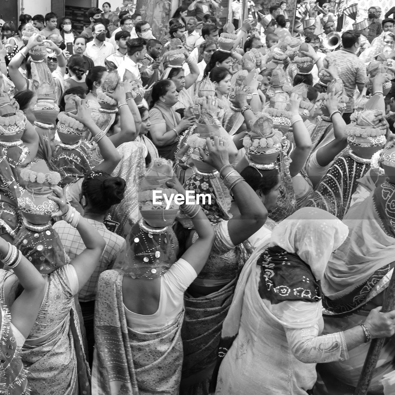Delhi, india april 03 2022 - women with kalash on head during jagannath temple mangal kalash yatra