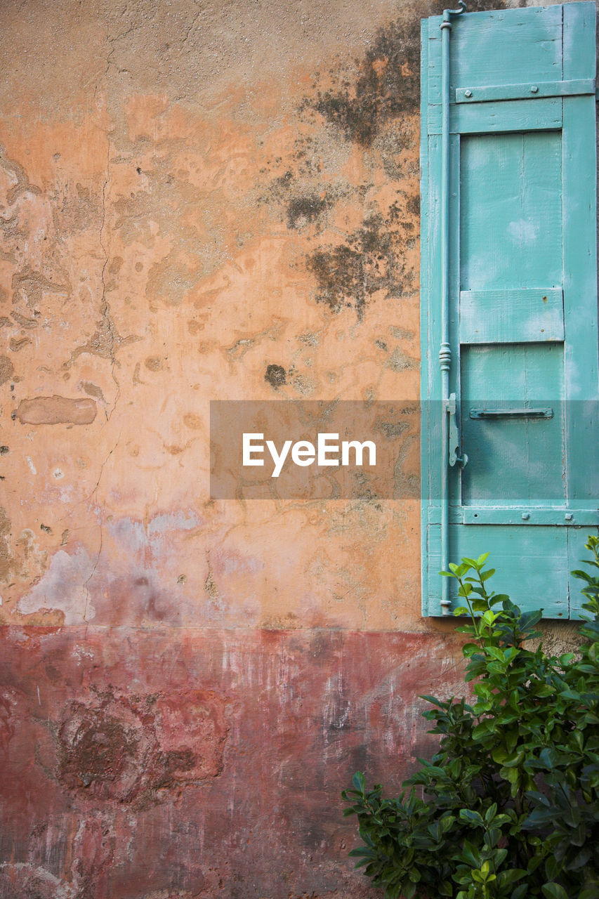 Old painted wall in provence, south of france, when a wall is like a painting