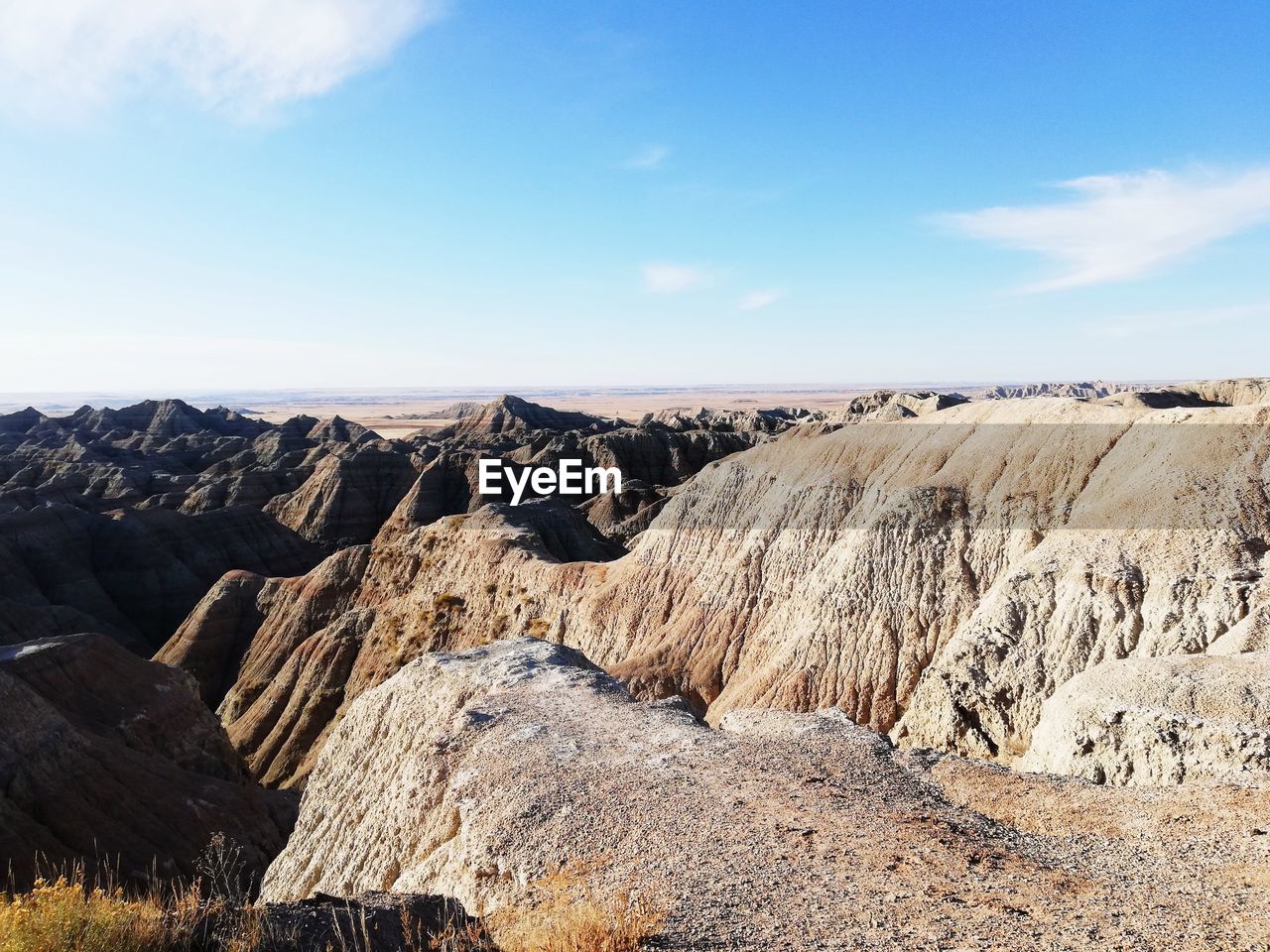 Scenic view of rocky mountains against sky