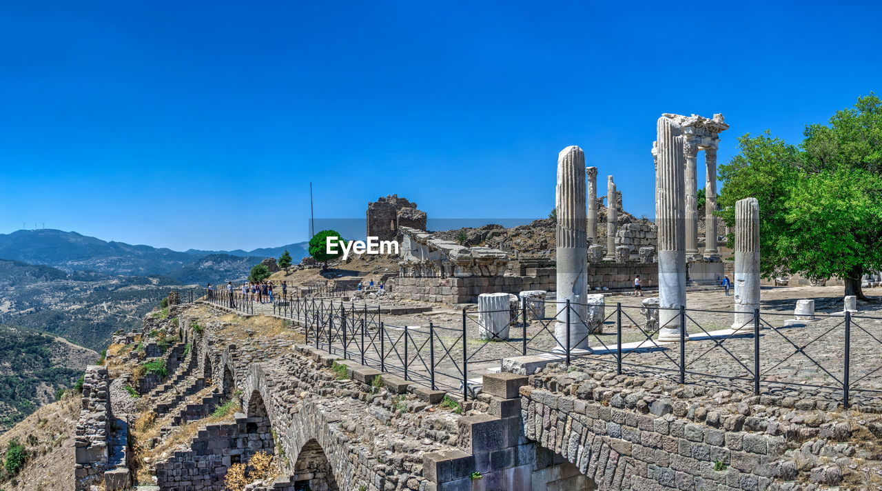 Panoramic view of historical building against blue sky