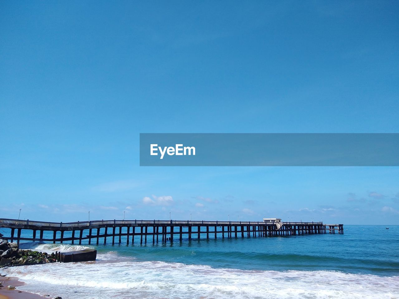 Scenic view of sea against clear blue sky, valiyathura sea bridge, thiruvananthapuram