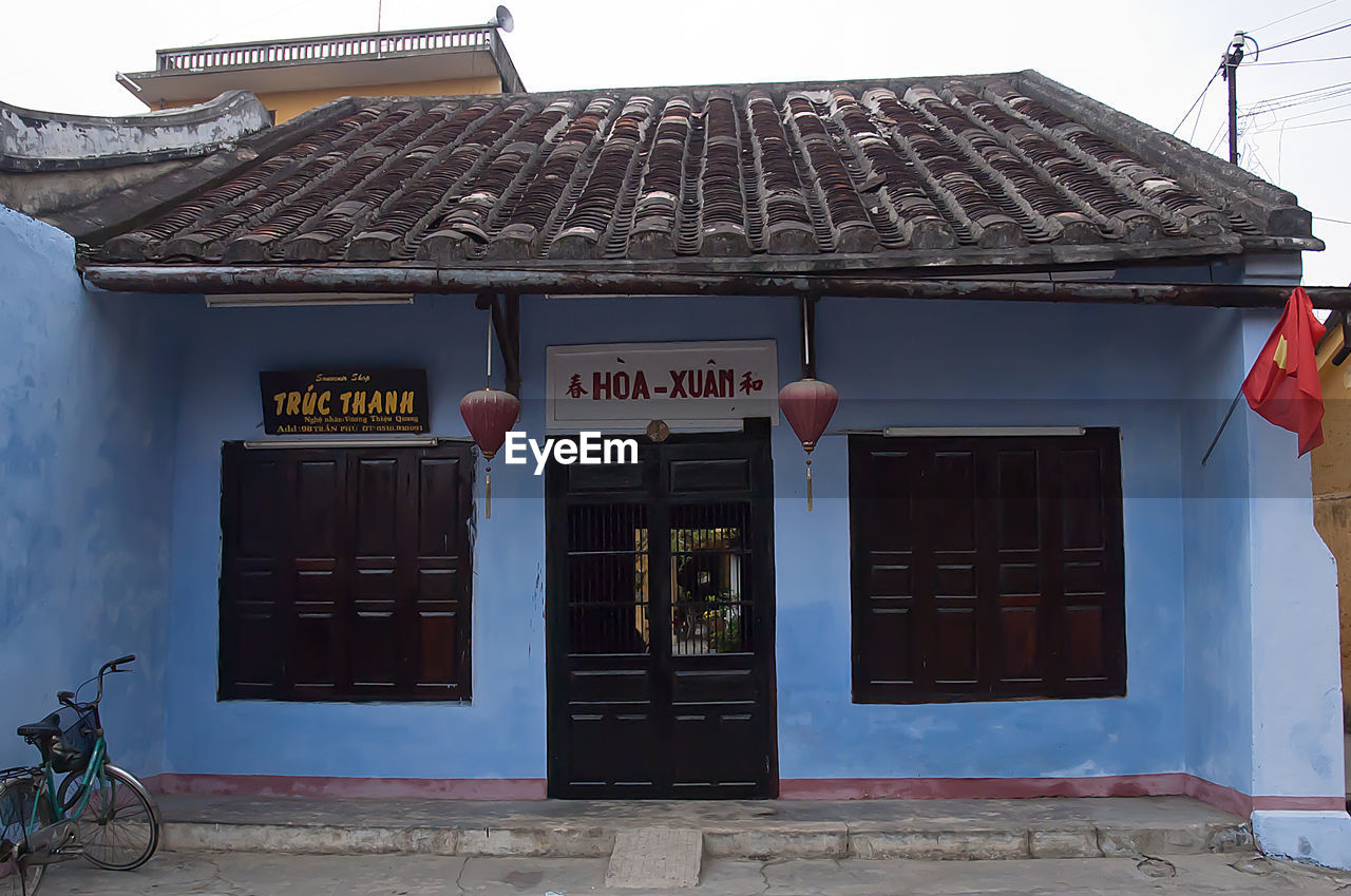 ENTRANCE OF BUILDING WITH SIGN