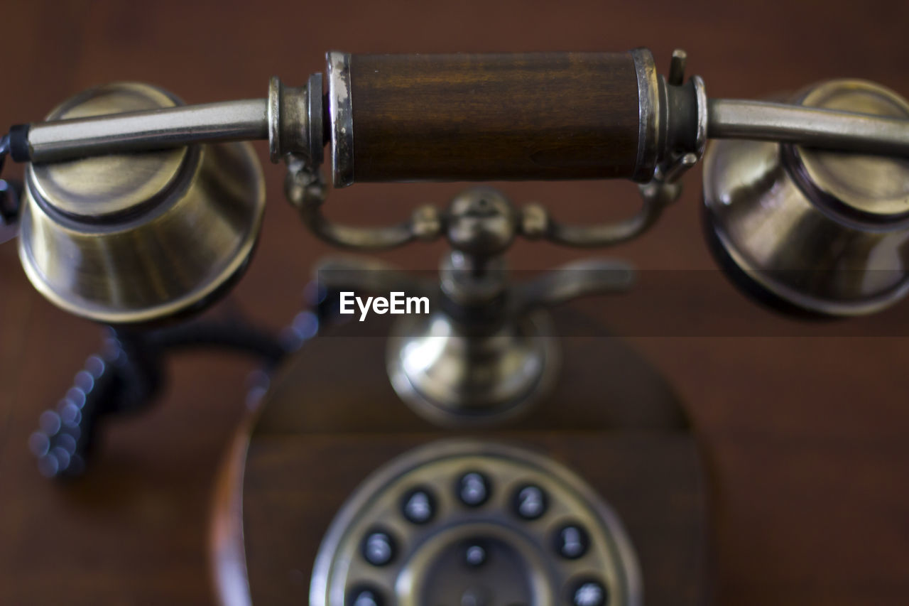 Close-up of telephone on table