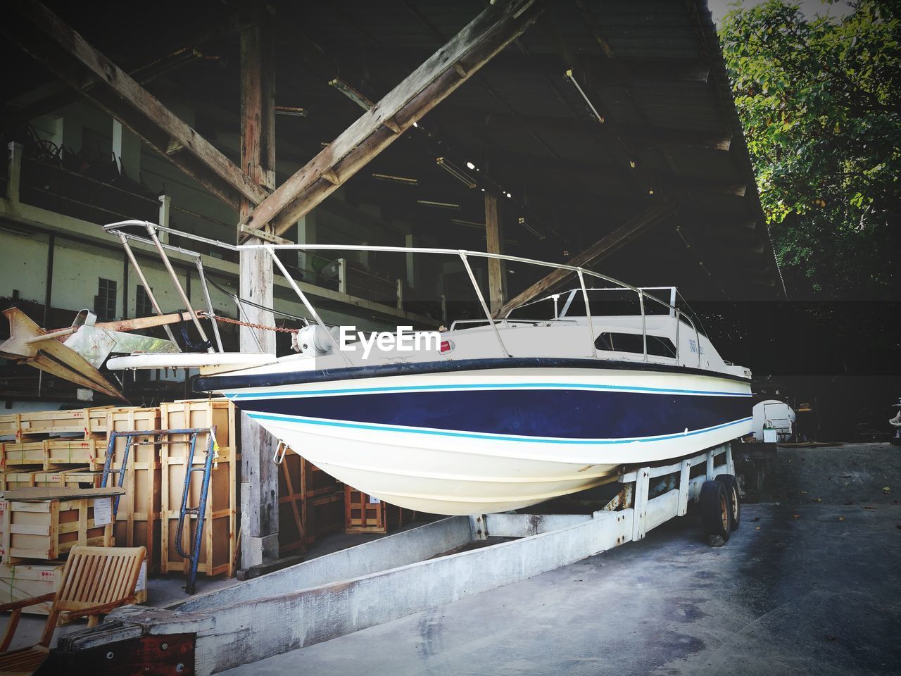 BOATS MOORED AT SHORE