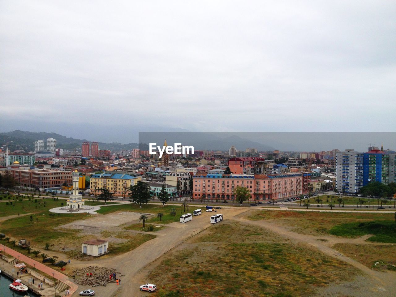 High angle view of city buildings against sky