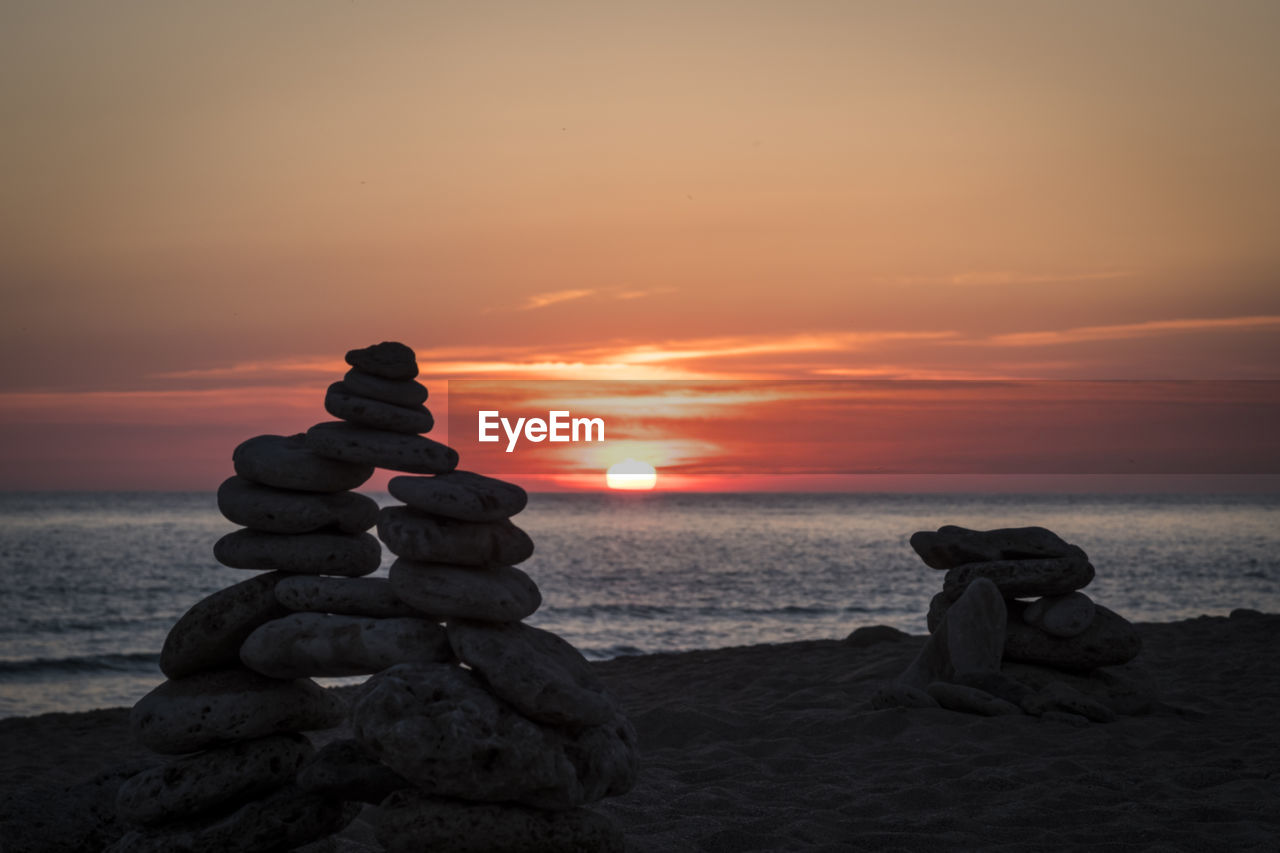 STACK OF STONES ON SHORE