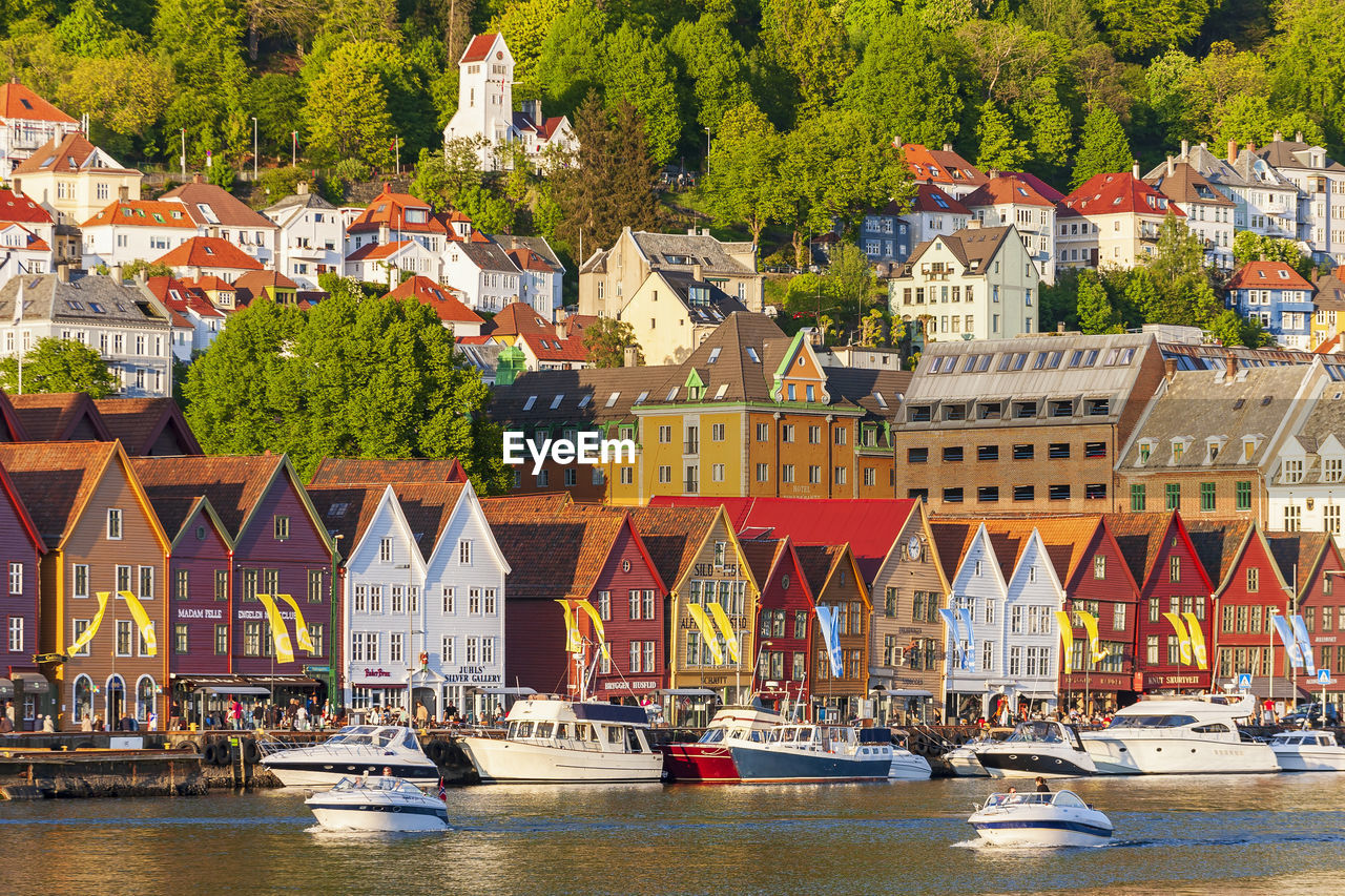 Boats at the quay at bryggen in the city bergen in norway