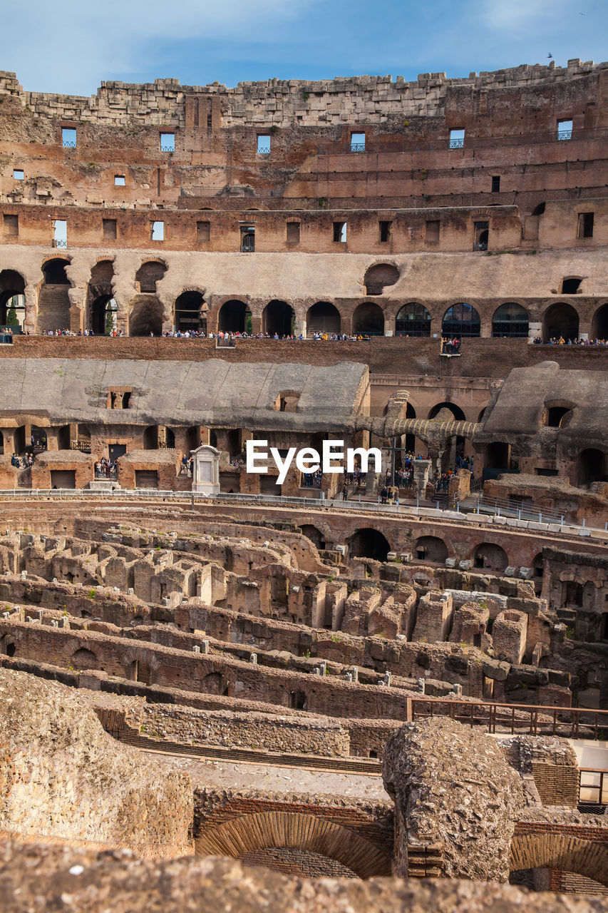 View of the seating areas and the hypogeum of the ancient colosseum in rome