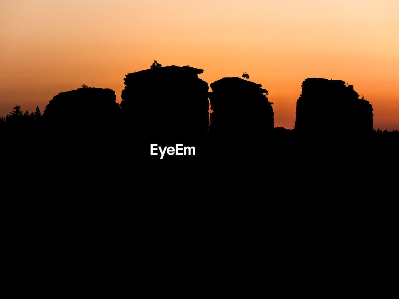 SILHOUETTE OF BUILDINGS DURING SUNSET