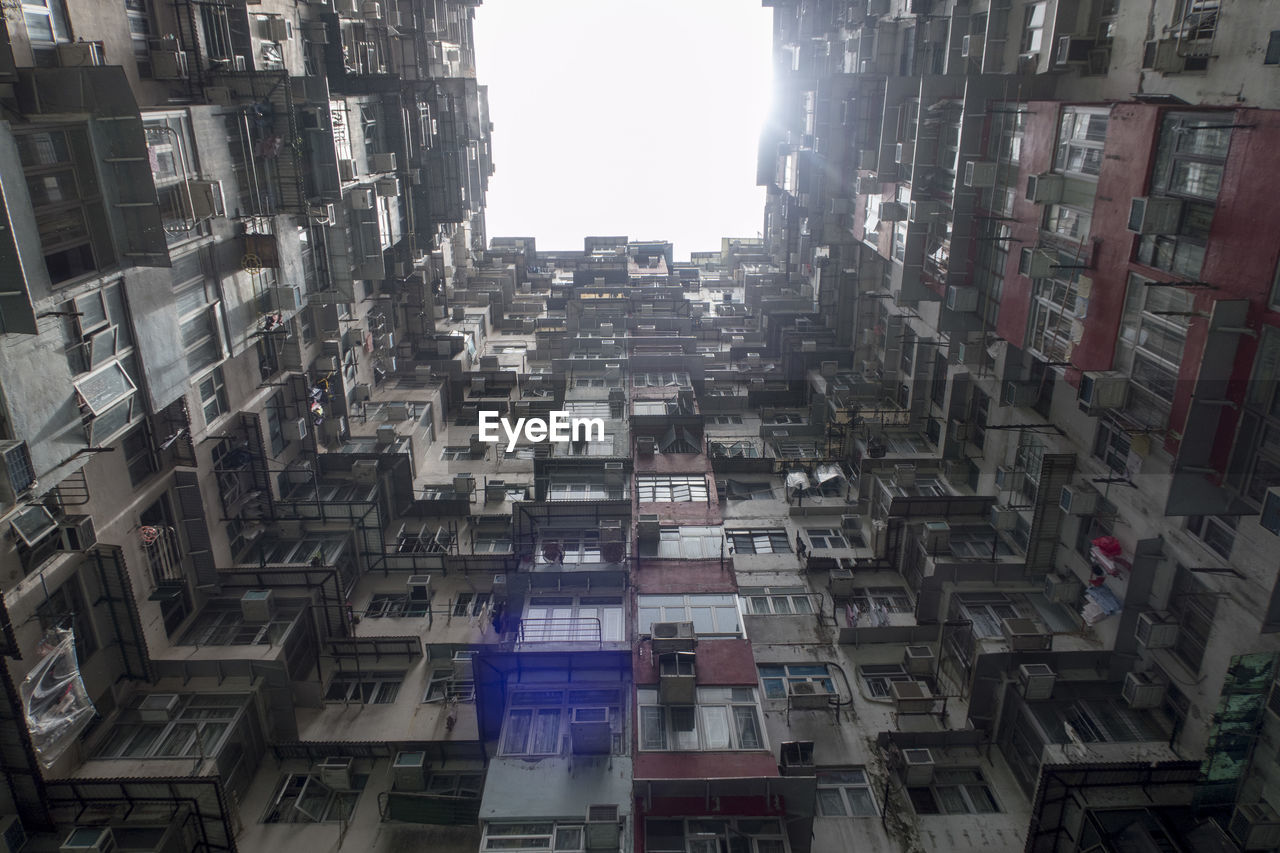 Exterior of modern buildings against clear sky, hong kong