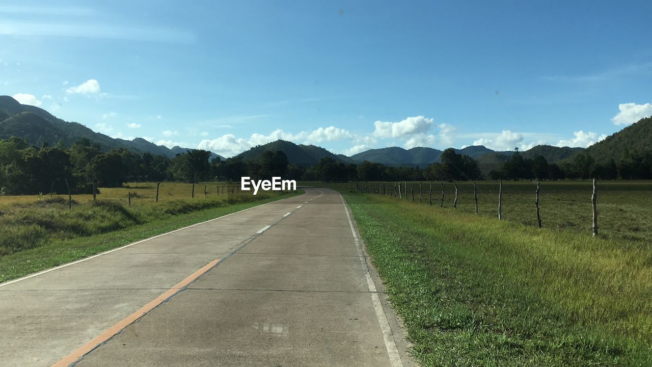 ROAD BY LANDSCAPE AGAINST SKY