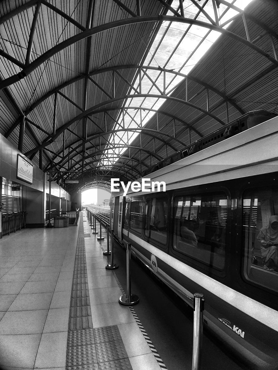 blurred motion of people walking in subway