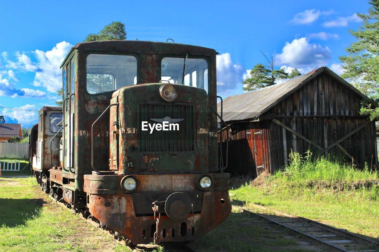 ABANDONED TRAIN ON RAILROAD TRACK