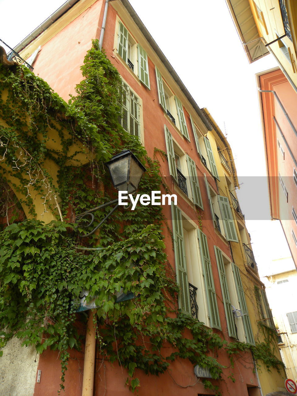 LOW ANGLE VIEW OF RESIDENTIAL BUILDING