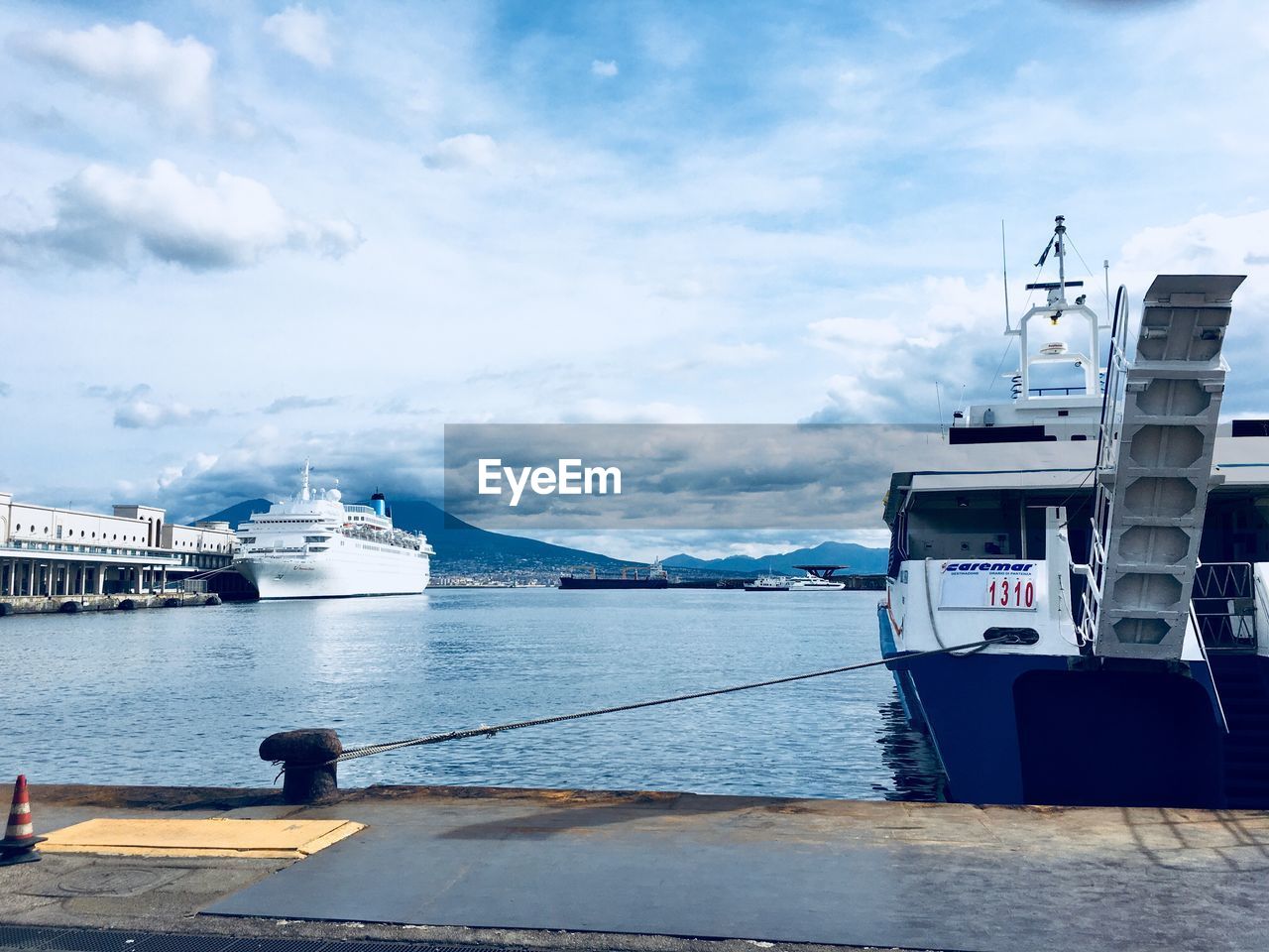 VIEW OF SHIP MOORED AT HARBOR