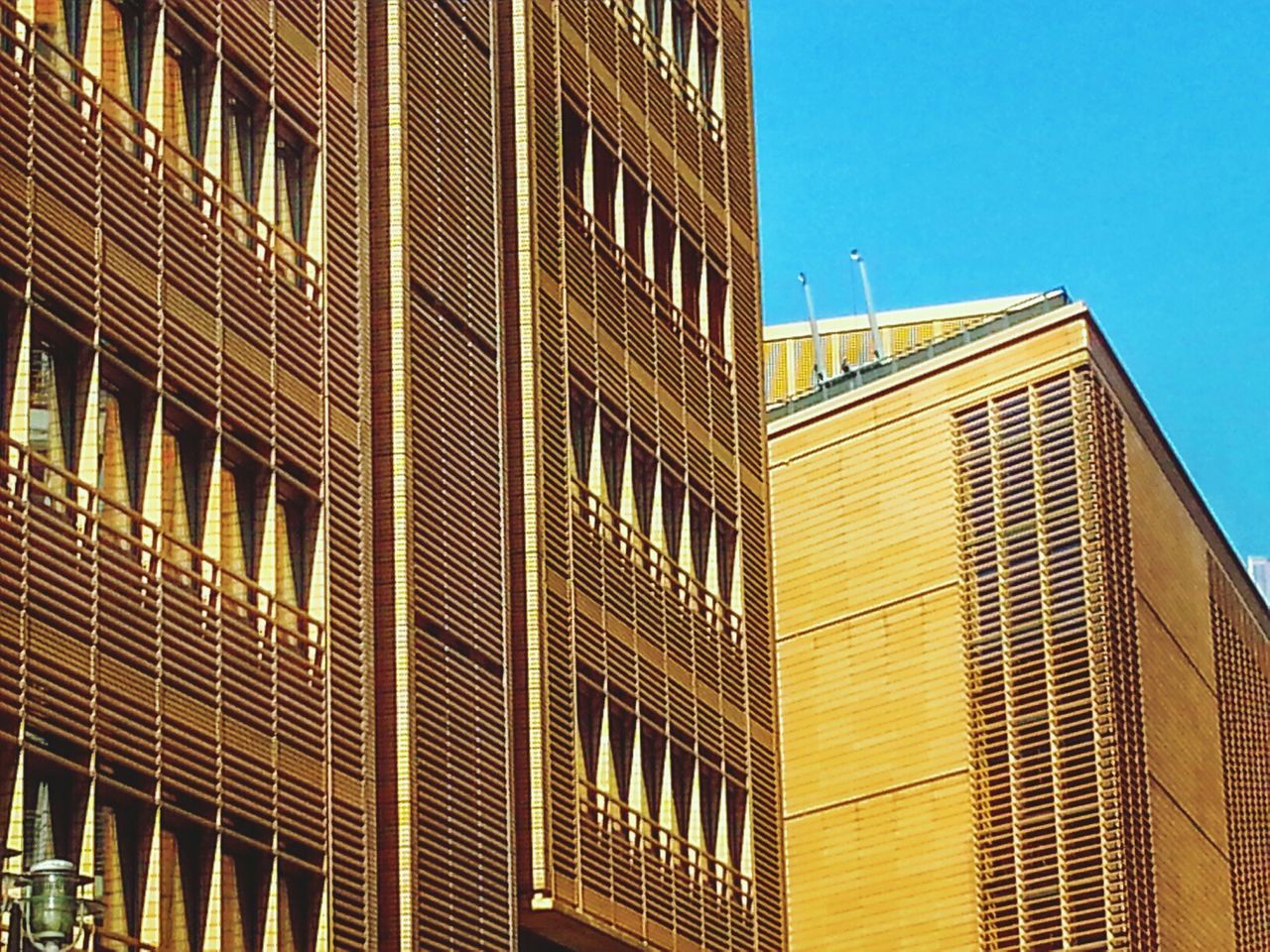 LOW ANGLE VIEW OF MODERN BUILDINGS