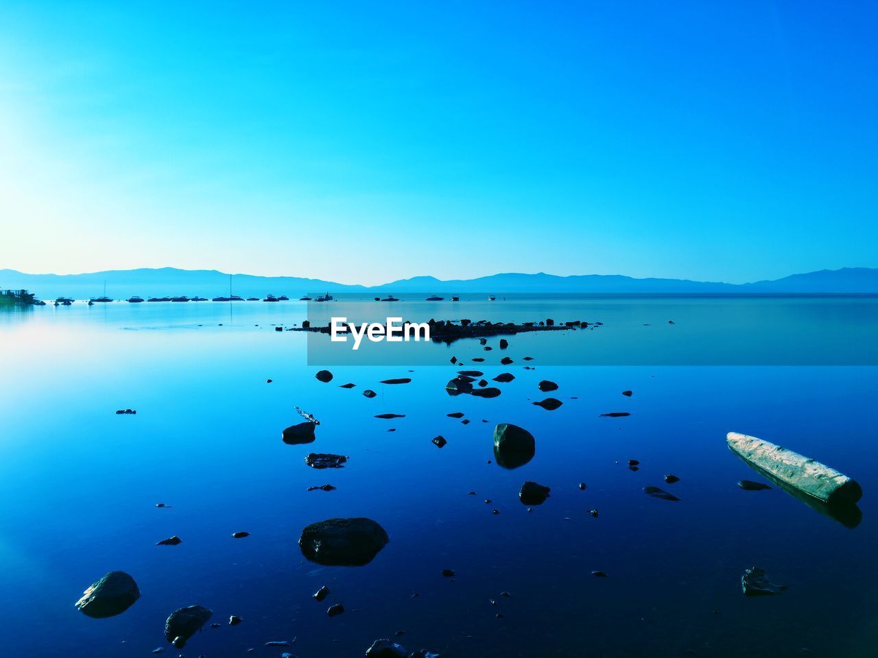 Idyllic shot of calm lake against sky