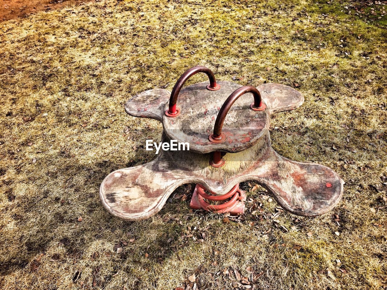 HIGH ANGLE VIEW OF SHOES ON TILED FLOOR