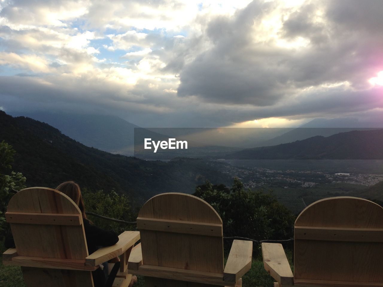 SCENIC VIEW OF MOUNTAINS AGAINST CLOUDY SKY