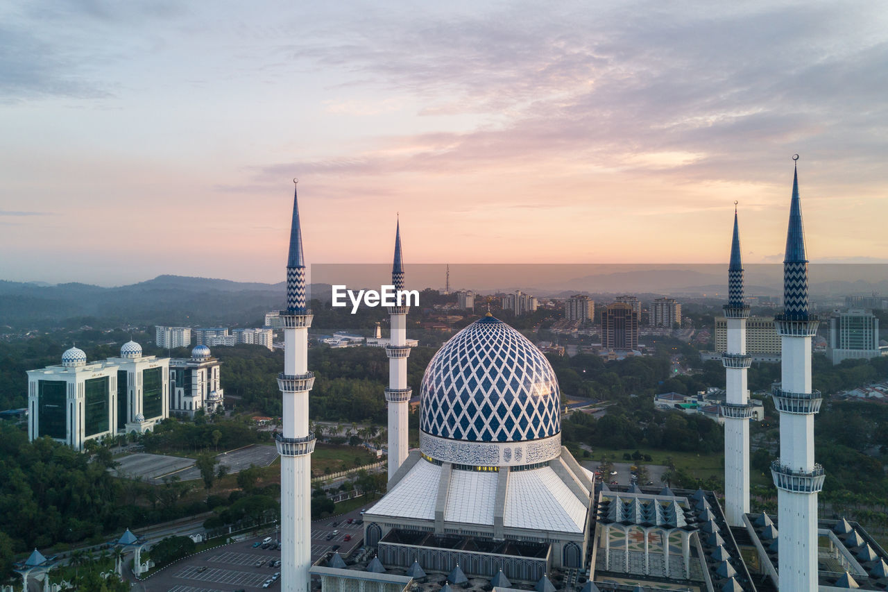 VIEW OF CITY AT SUNSET