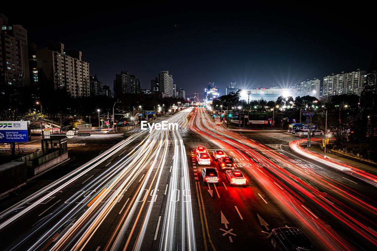 high angle view of light trails on city at night