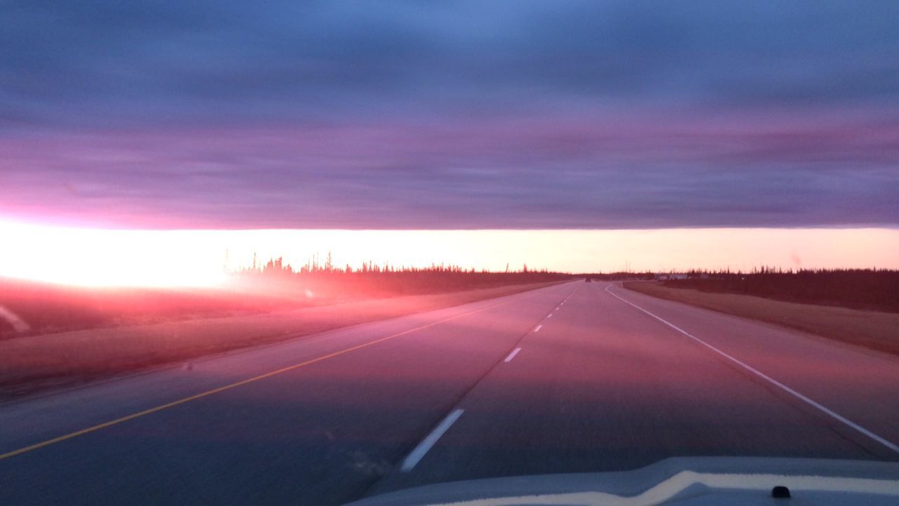 Scenic sunset over empty road