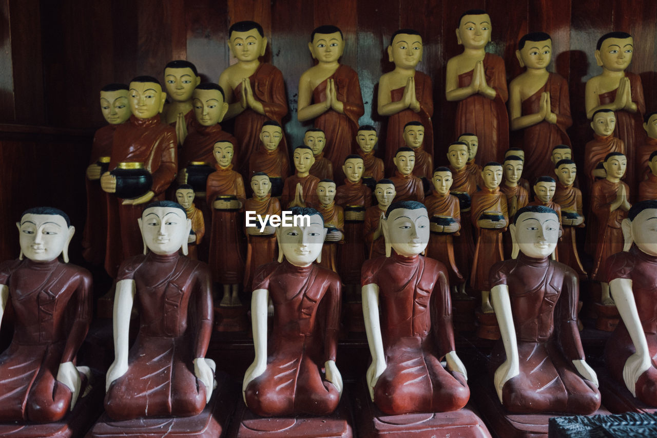 Close-up of buddha figurines for sale