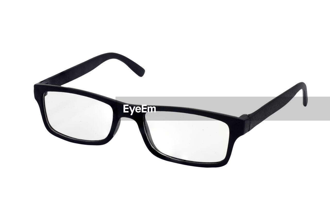 Close-up of eyeglasses against white background