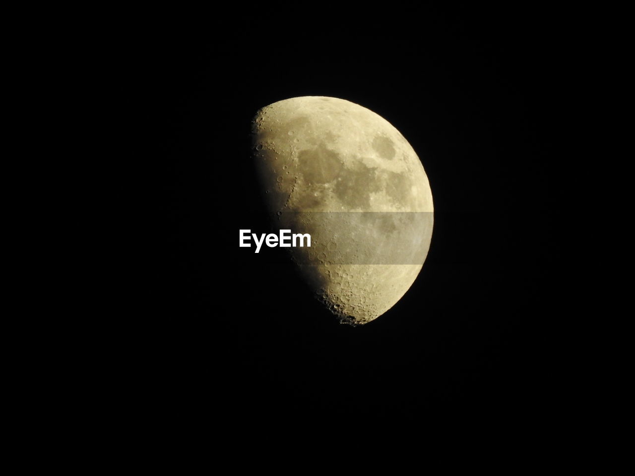 LOW ANGLE VIEW OF MOON AGAINST CLEAR SKY