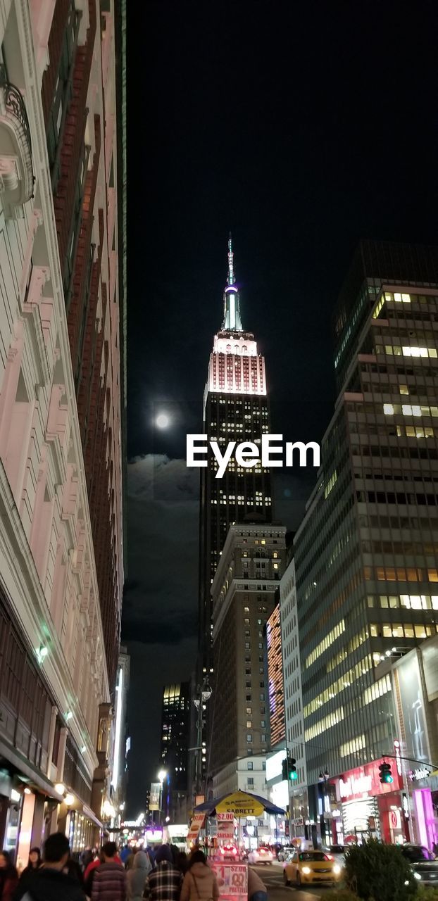 ILLUMINATED BUILDINGS AT NIGHT