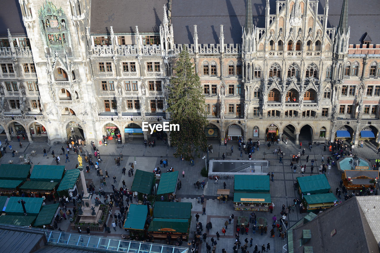 High angle view of people at marienplatz by building in city