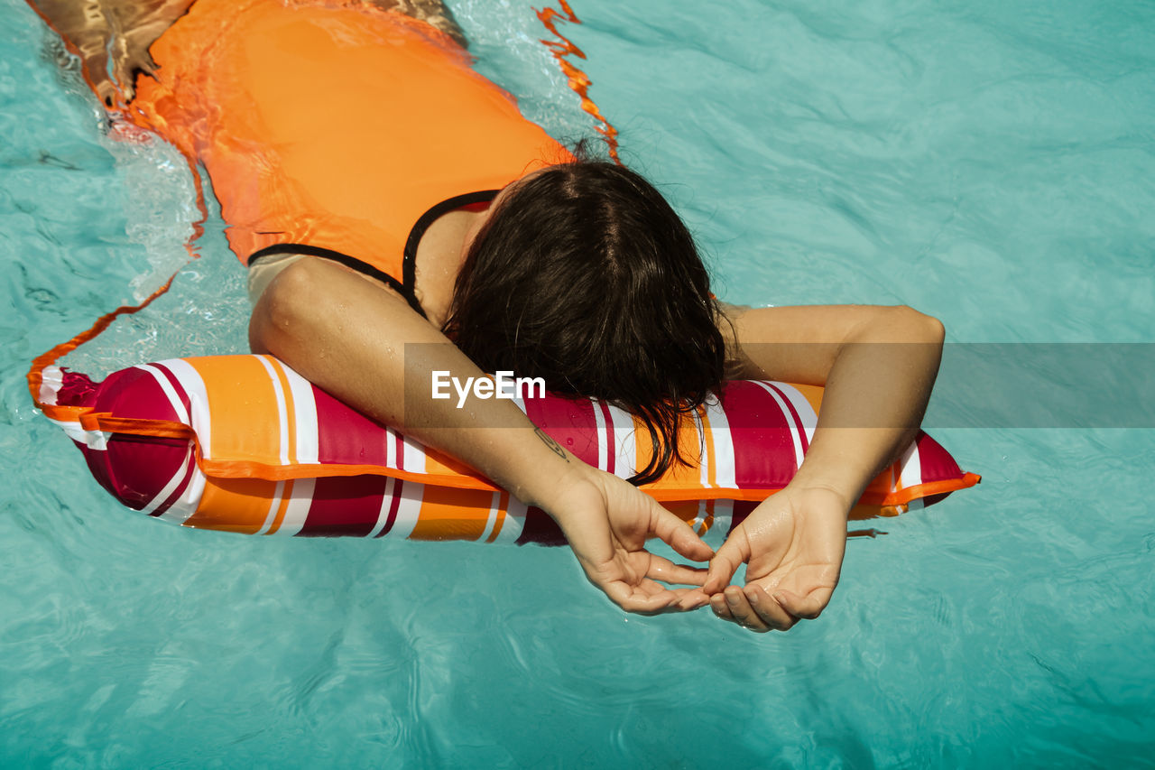 High angle view of woman in swimming pool 