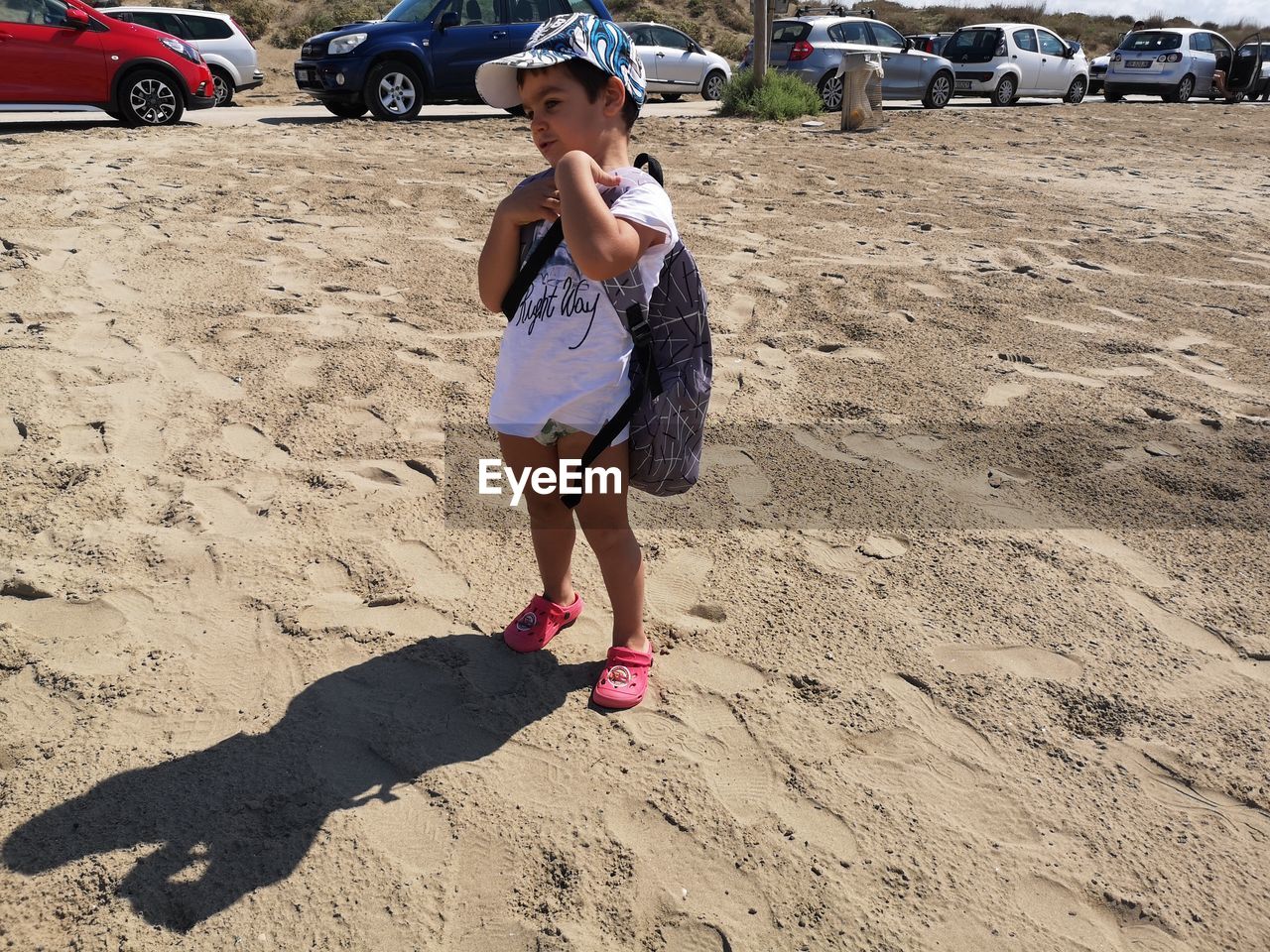 FULL LENGTH OF GIRL ON SAND