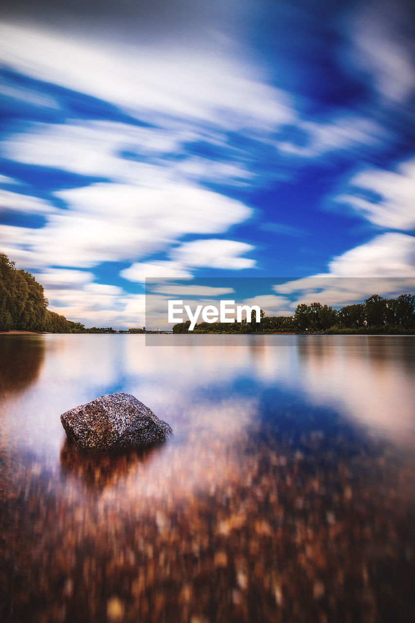 Cloudy sky above the river rhine in worms, germany