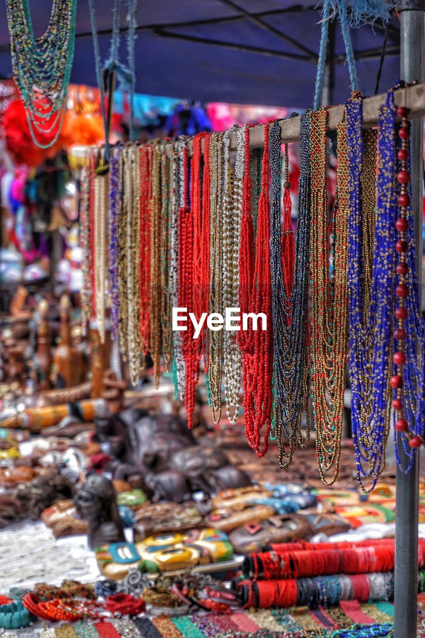 Various hanging for sale at market stall