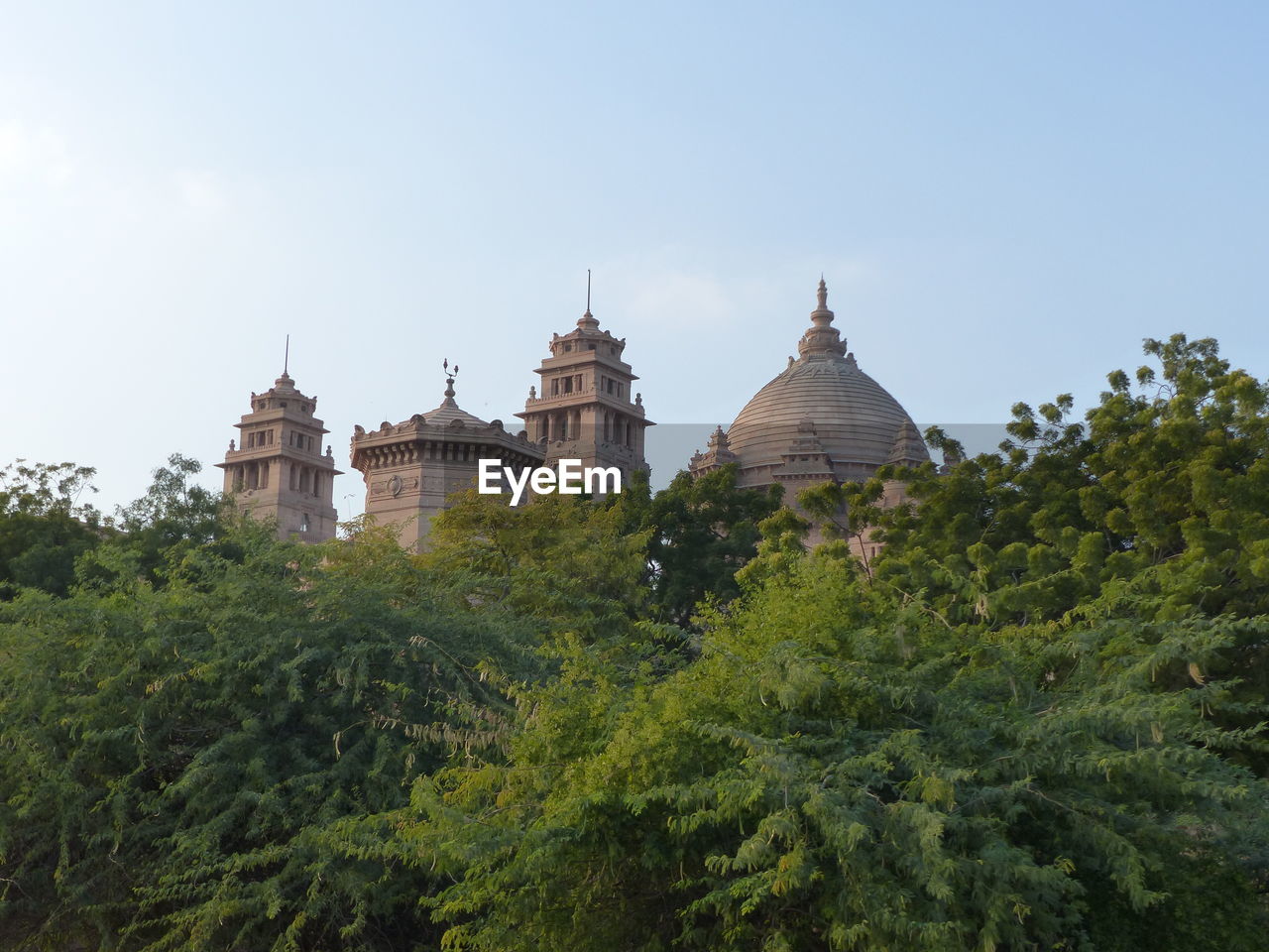 architecture, built structure, travel destinations, building exterior, plant, travel, sky, tree, history, nature, religion, building, the past, château, tourism, dome, no people, place of worship, belief, outdoors, castle, city, landmark, spirituality, business finance and industry, environment, day, clear sky, temple - building, ancient