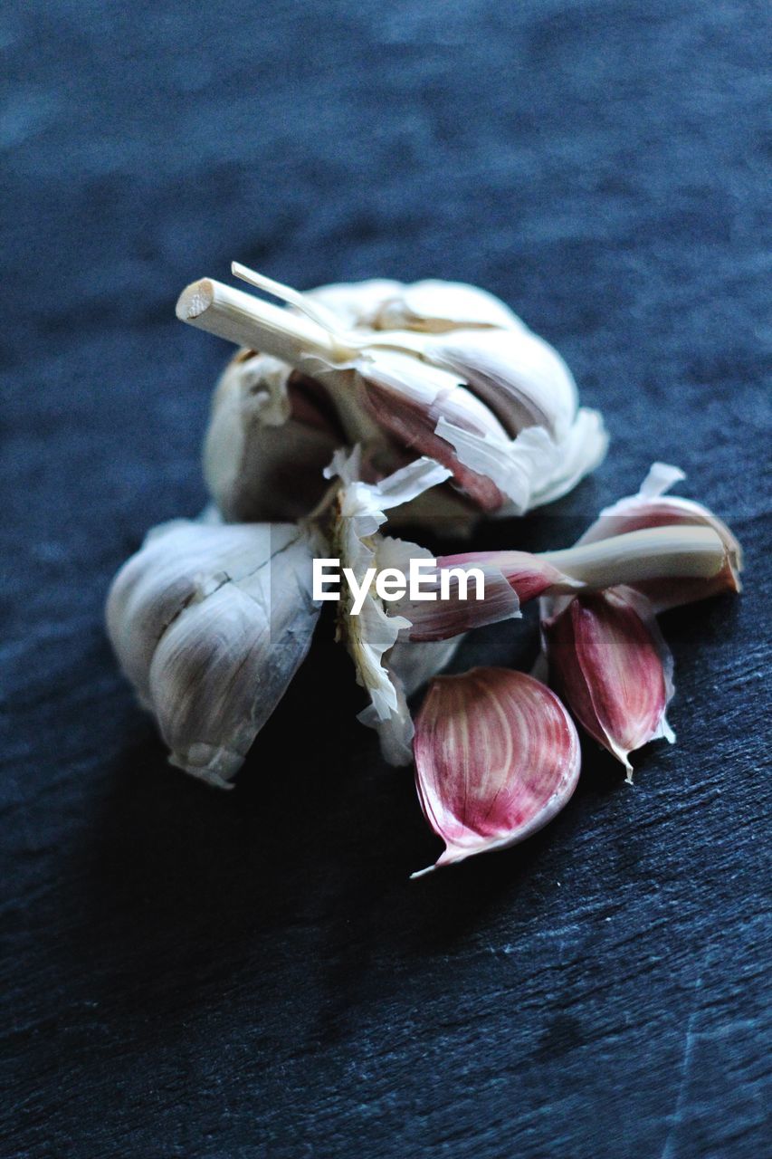 Close-up of garlic on table