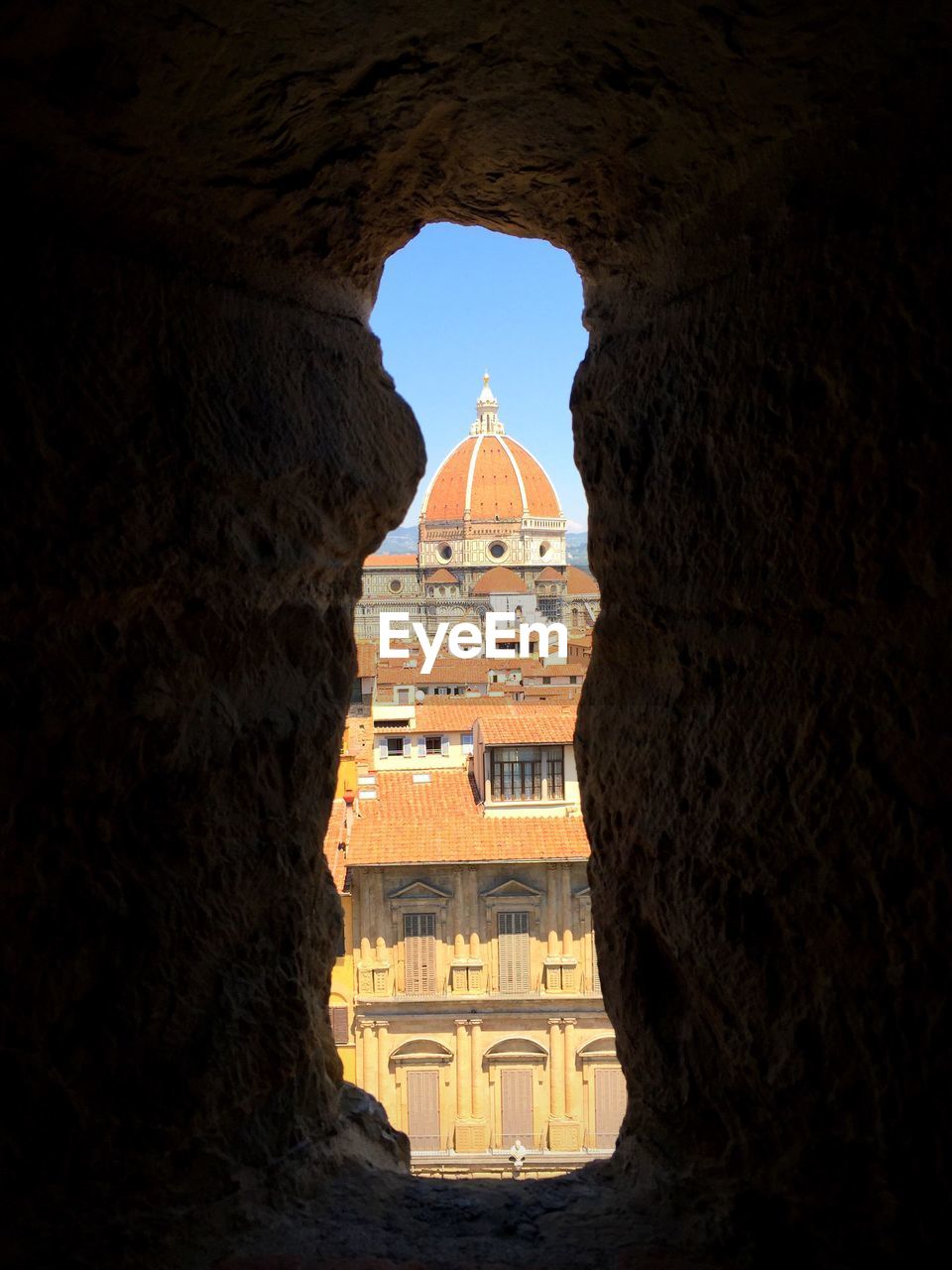 Florence cathedral in city seen through window