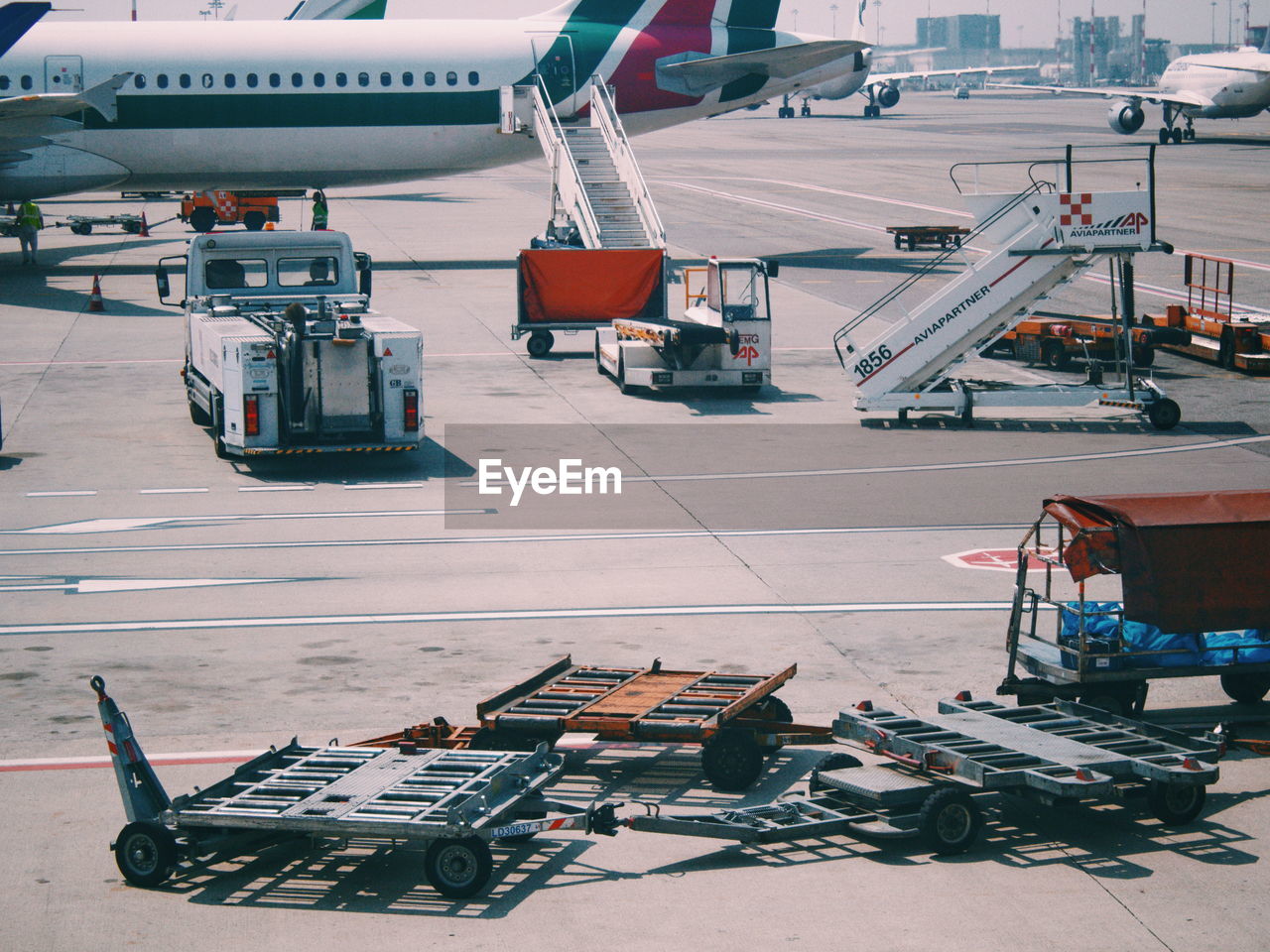 HIGH ANGLE VIEW OF AIRPLANE ON ROAD