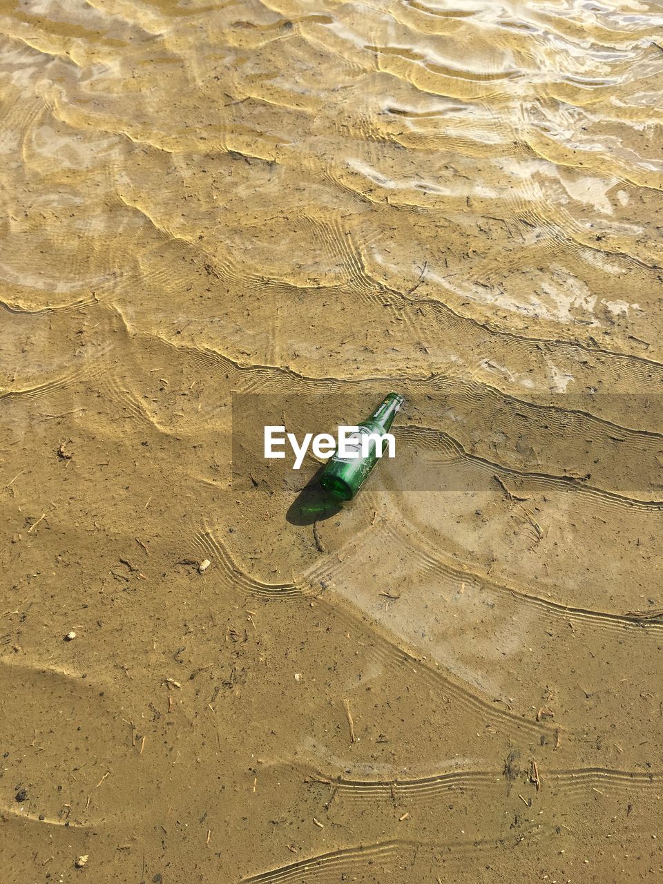 HIGH ANGLE VIEW OF BEACH ON SAND