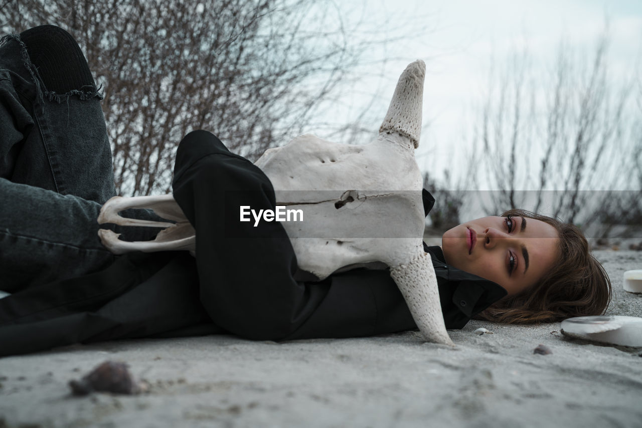 Portrait of girl lying on floor